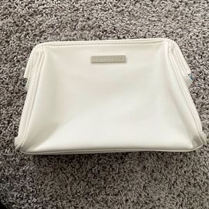 Rodan + Fields White make up bag